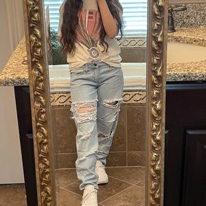 Fashion Nova Heavily Distressed Light Wash Mid Rise Jeans